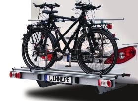 Load carrier for the rear of a motorhome
